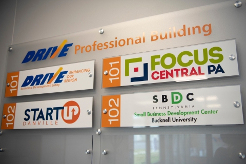 The Startup Danville and Bucknell SBDC sign at the DRIVE building.