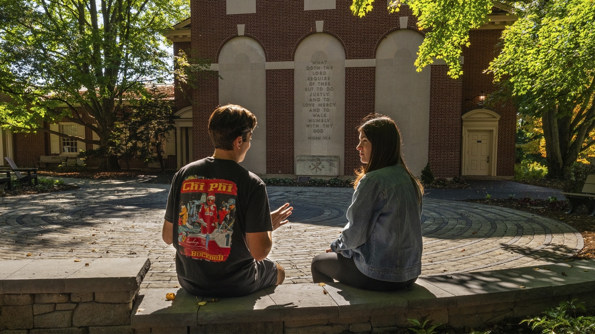 BU Magazine 2025 Winter Header - two students sitting outside