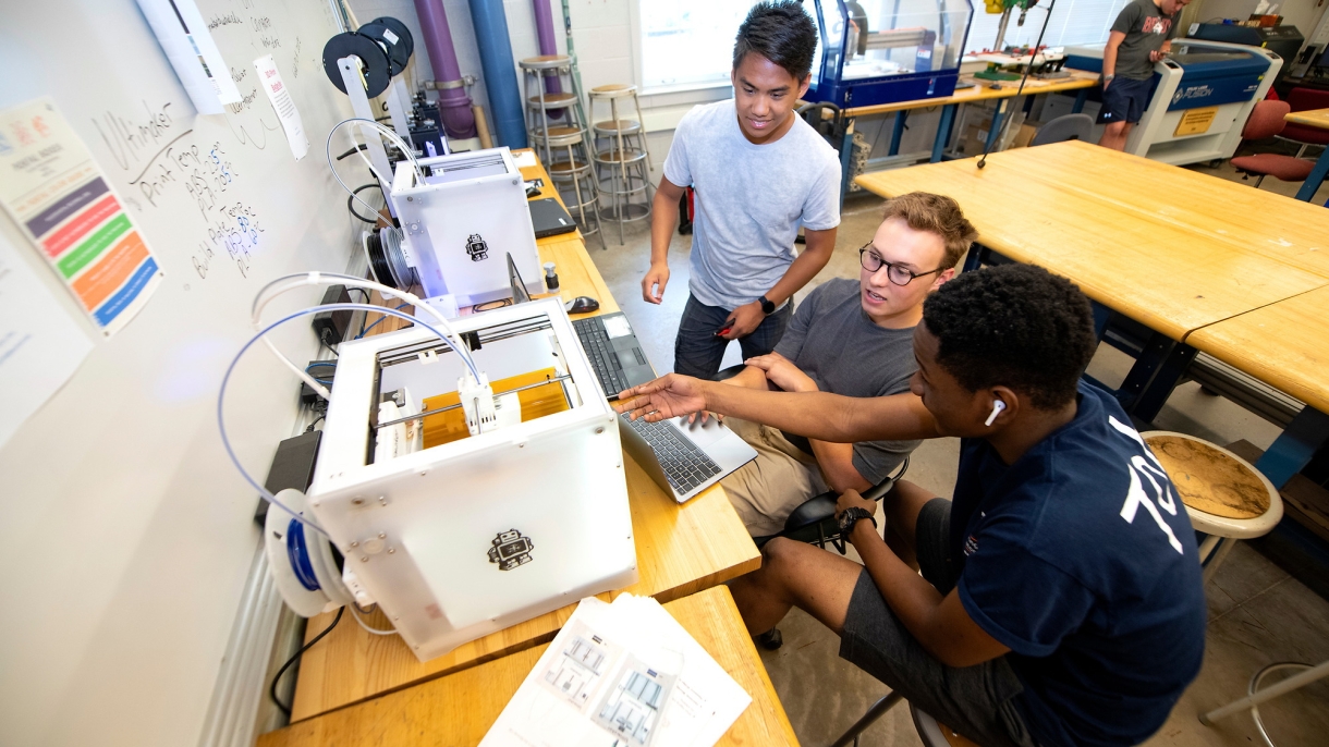 Engineering EXCELerator students in Mooney Lab with 3D printers