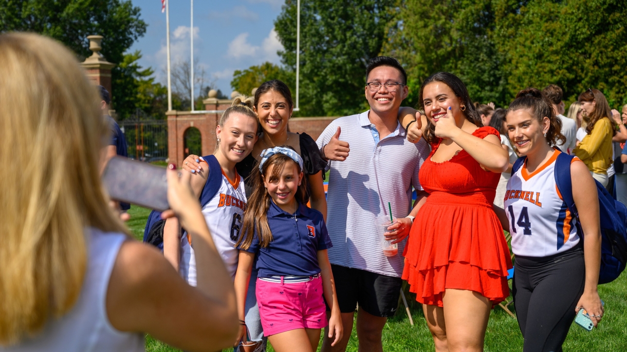 People pose for a photo during Family Weekend