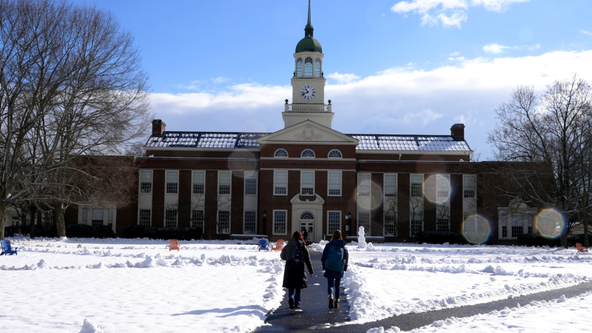 Students walk on Bucknell&#039;s snowy Quad in the winter 