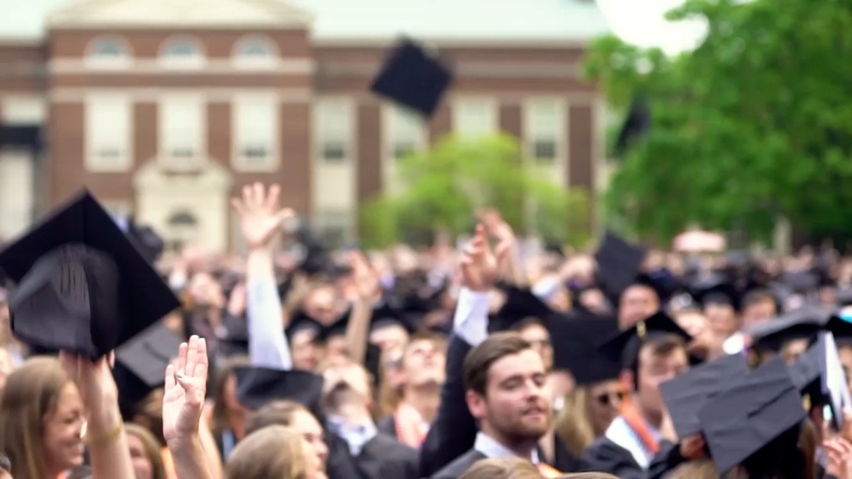Graduates toss caps at Commencement on Malesardi Quadrangle