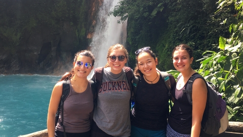 Students near waterfall in Costa Rica