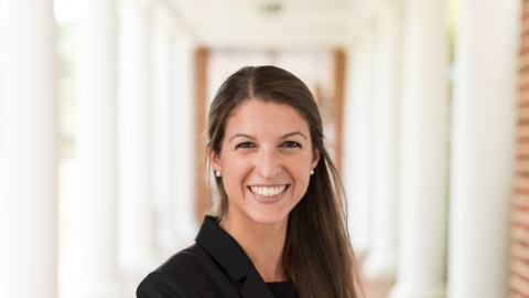 Rachel Gibson poses under a colonnade on the University of Virginia campus