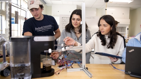 Senior Design students working on the Keurig project