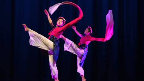 Photo of students dancing with watersleeves