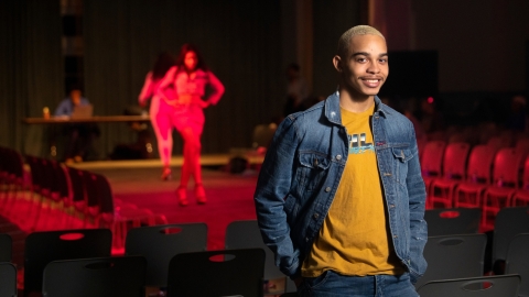 Brandon Vessels &#039;22 poses in front of runway