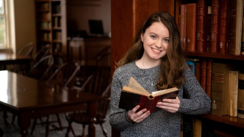 Giuliana reading a book