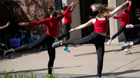 Students dance outside of the Elaine Langone Center