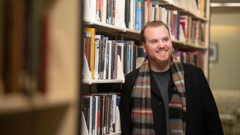 Portrait of Rich Stover '20 in library