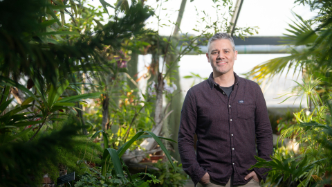 Portrait of Professor Mark Haussmann inside the Rooke Science Greenhouse