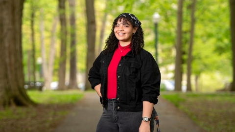 Aries Contreras '22 stands in the Grove