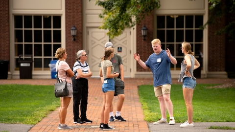 Student giving a tour on Malesardi Quad