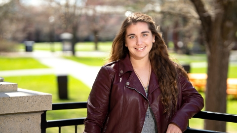 Daniela Bellini ’22 poses outside Dana Engineering Building on the science quad.