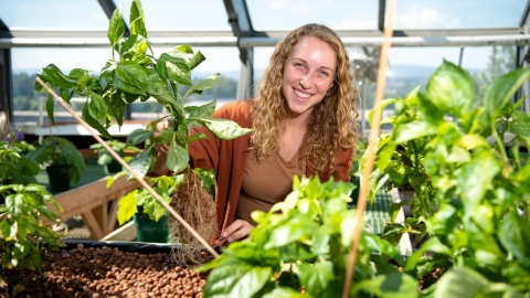 Lucille Ketterer '23 in Rooke greenhouse