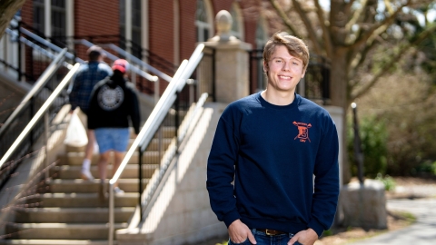 Philip Onffroy stands outside the entrance to Dana Engineering Building