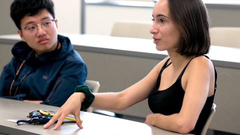 Student speaks in classroom.