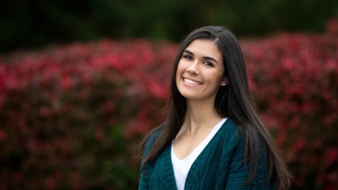 Macy Albaitis smiles at camera