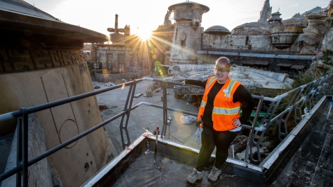 Rachel Sherbill '09 stands in front of the Millennium Falcon