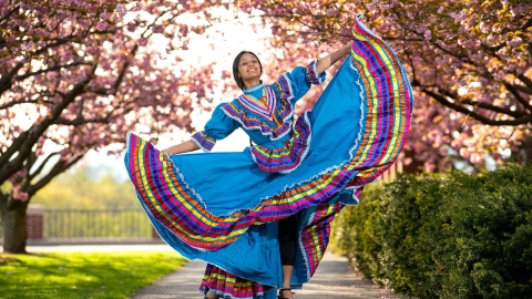 Gabby Diaz&#039; dances folklorico among blossoming cherry trees