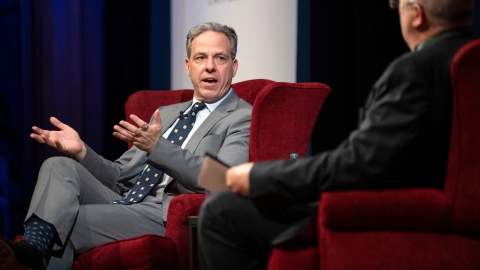 Jake Tapper speaks on stage at the Bucknell Forum