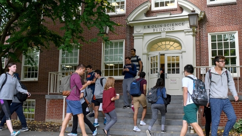 Exterior of Olin Science with students
