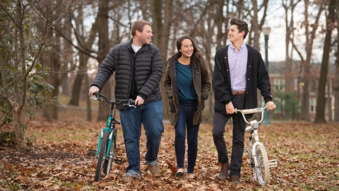 Students with bicycles in The Grove