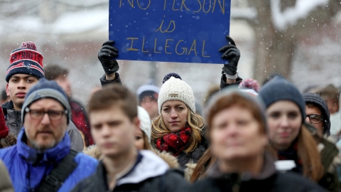 Student holding sign at protest