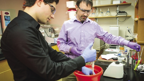 Professor and student in the lab