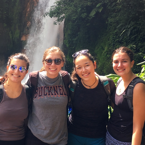 Students near waterfall in Costa Rica