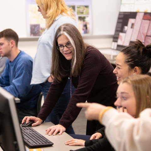 Professor teaching in GIS lab