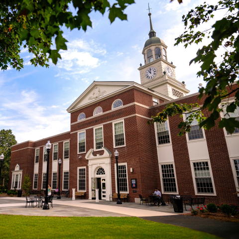 Exterior of Bertrand Library with a blue sky