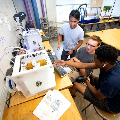 Engineering EXCELerator students in Mooney Lab with 3D printers