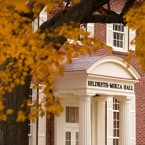 A fall picture of Hildreth-Mirza Hall's entrance