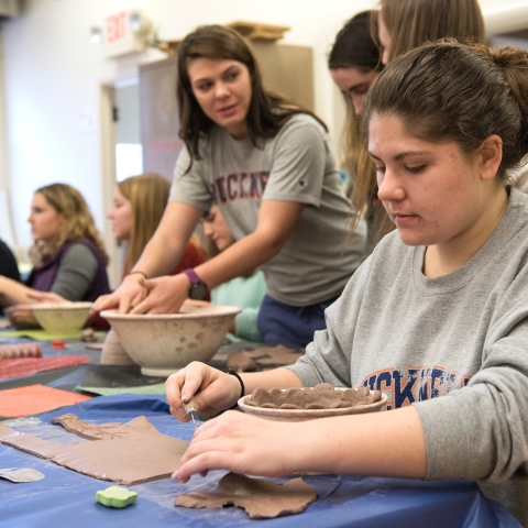 Students making bowls