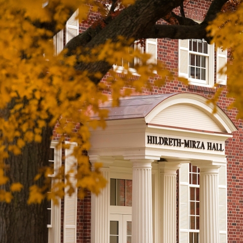 A fall picture of Hildreth-Mirza Hall&#039;s entrance