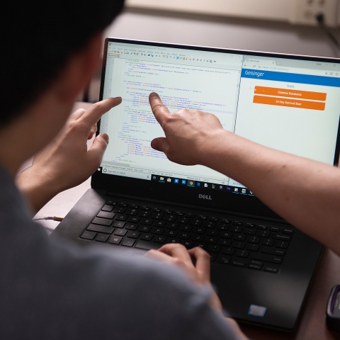 Computer science major looks over a Geisinger app