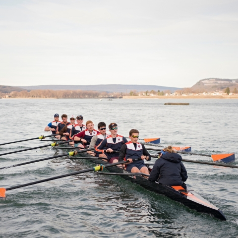 Men&#039;s crew team on the water