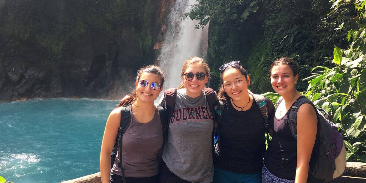 Students near waterfall in Costa Rica