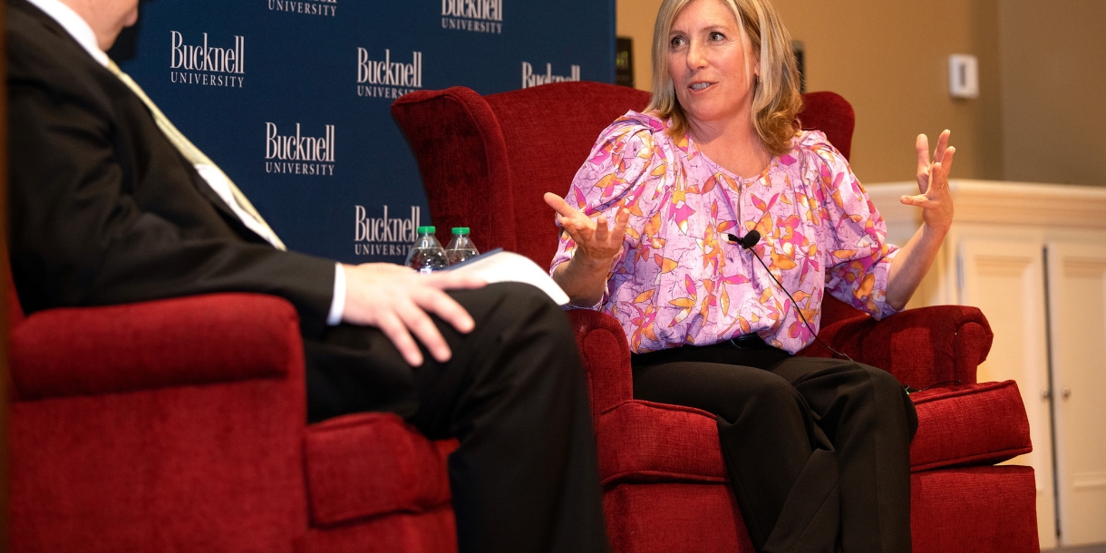 Barbara F. Walter &#039;86 sits on stage with Bucknell President John Bravman.