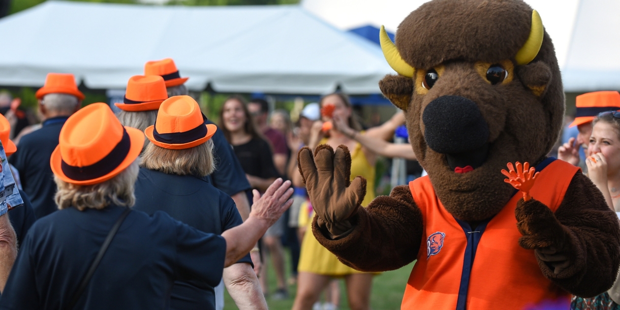 Bucky giving high fives at Reunion