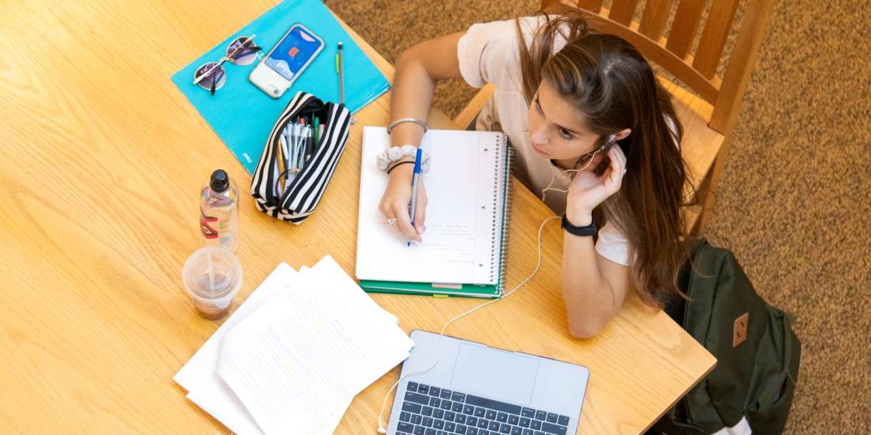 Bucknell University student in Bertrand library on reading day