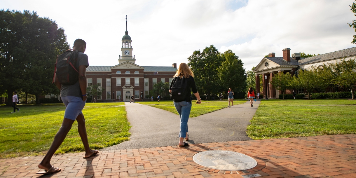 Two students walking on Malesardi Quad at Bucknell University