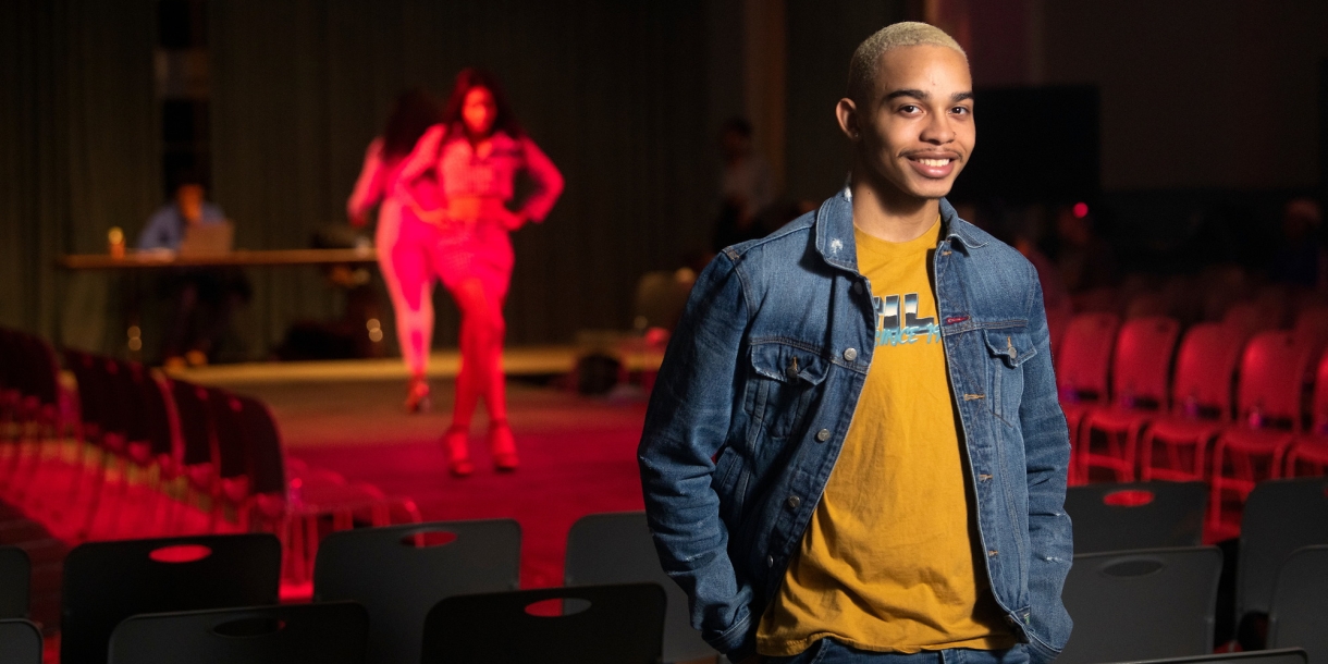 Brandon Vessels &#039;22 poses in front of runway