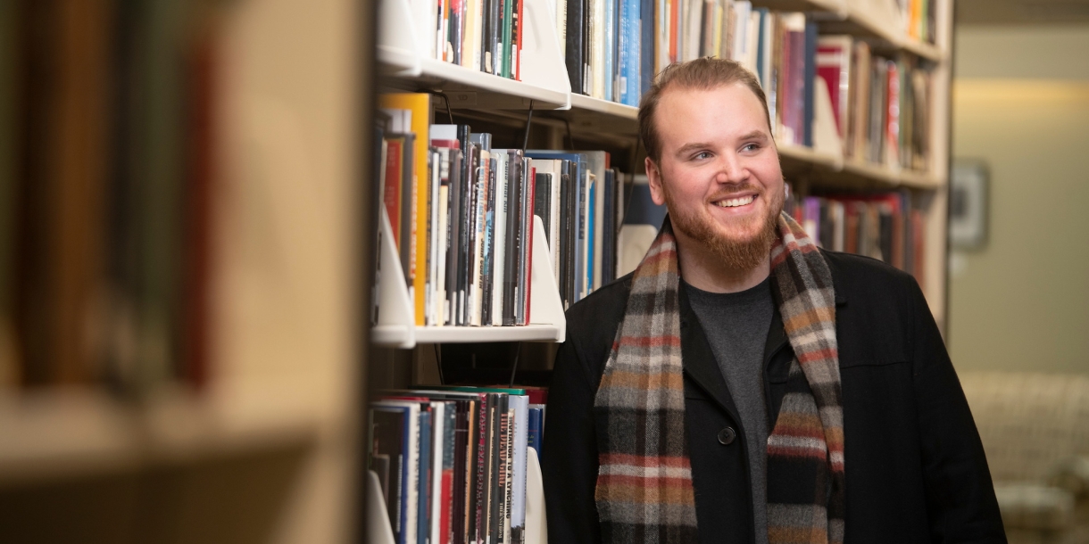 Portrait of Rich Stover '20 in library