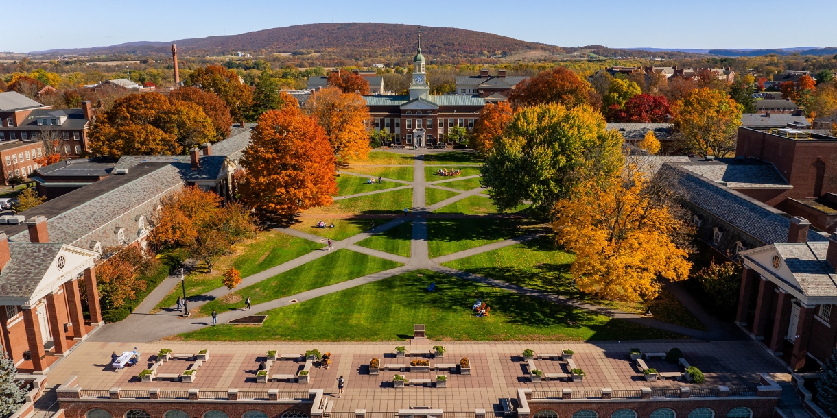 Aerial photo of Bucknell University's Malesardi Quad on a blue sky fall day