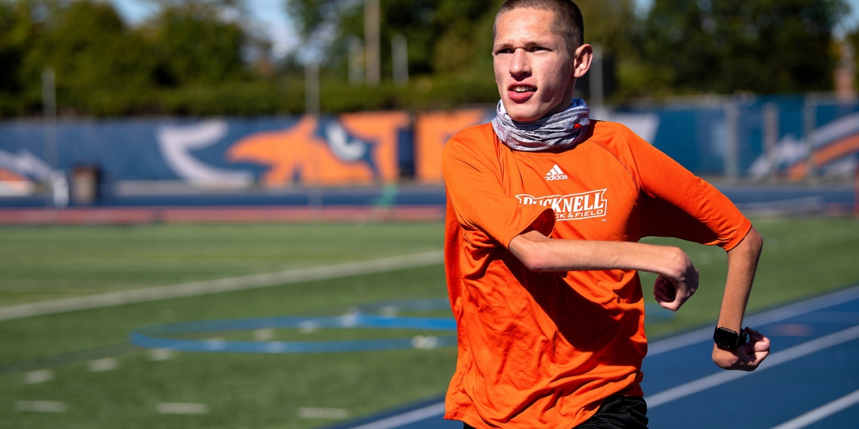 Rayven Sample '24 runs on Bucknell's track