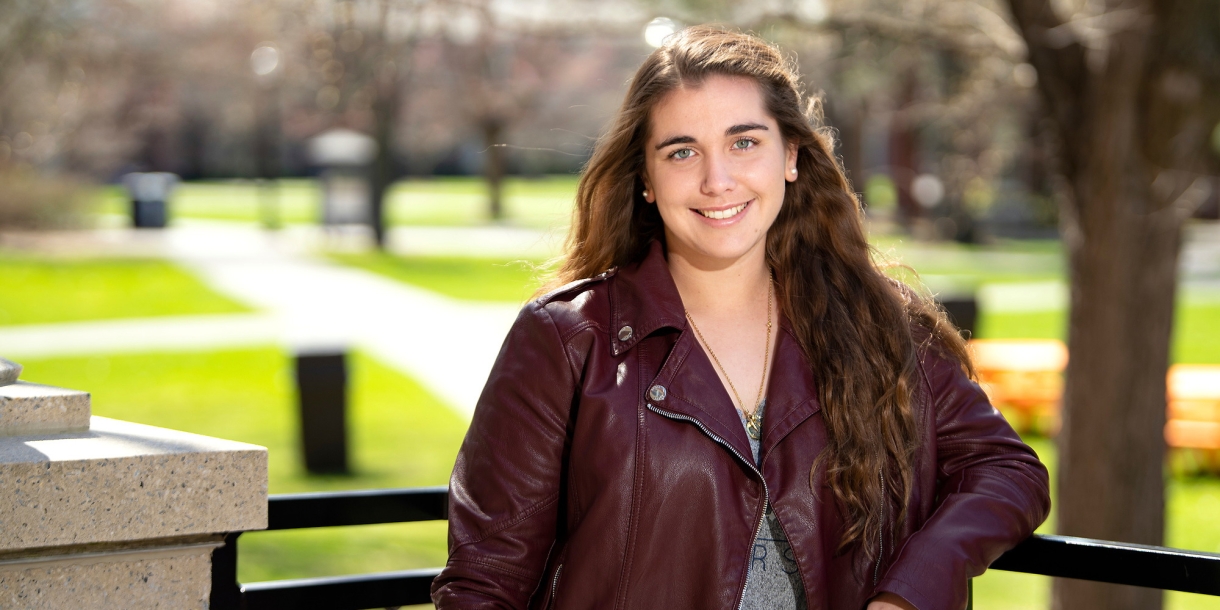 Daniela Bellini ’22 poses outside Dana Engineering Building on the science quad.