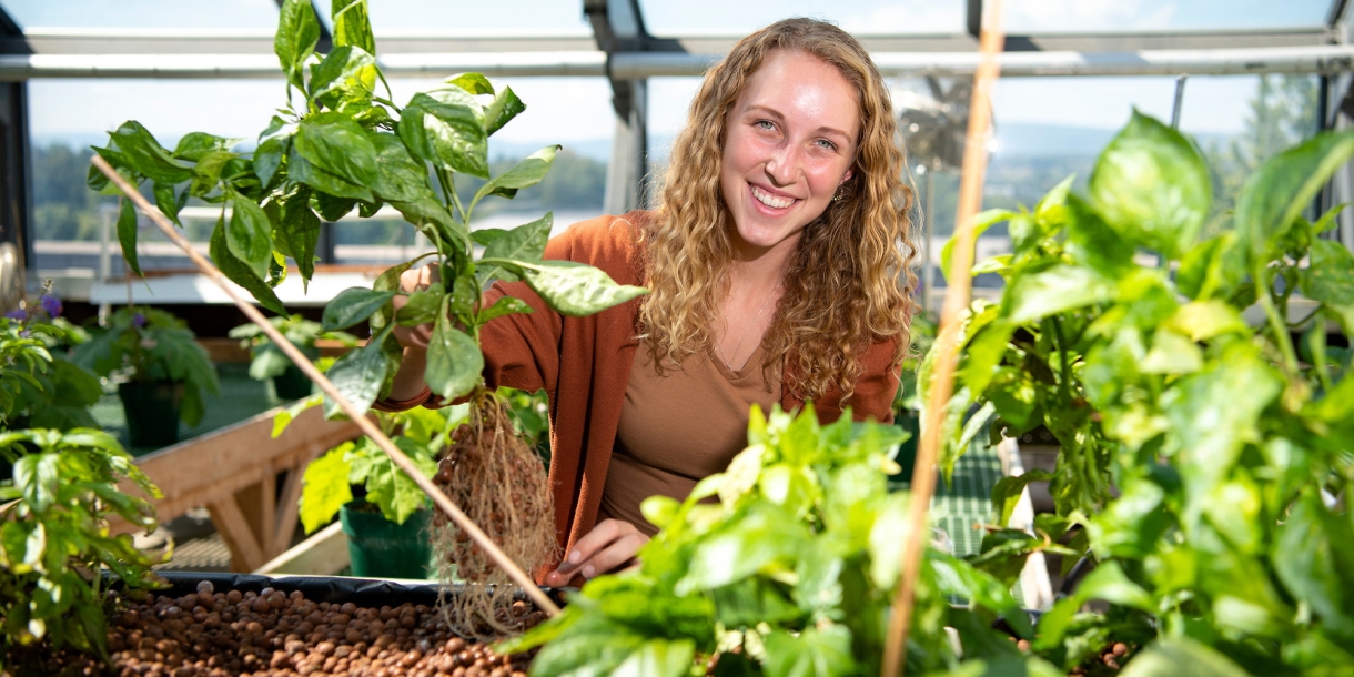 Lucille Ketterer '23 in Rooke greenhouse