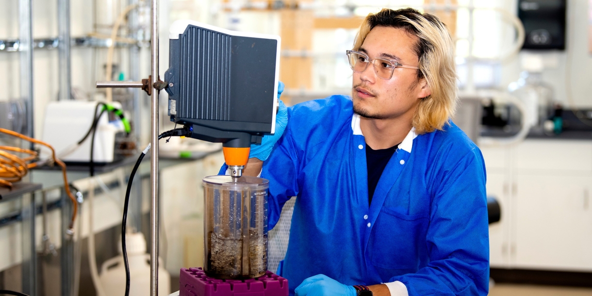 Ryan Iwata '22 experiments with sludge